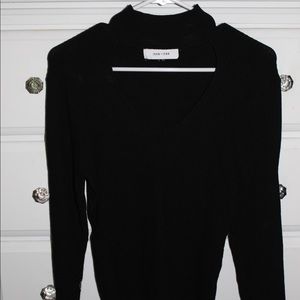 black sweater with cut out